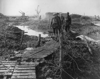 NZ troops on duckboards. Ypres area 1917. National Army Museum Waiouru. NAM 1994 3346